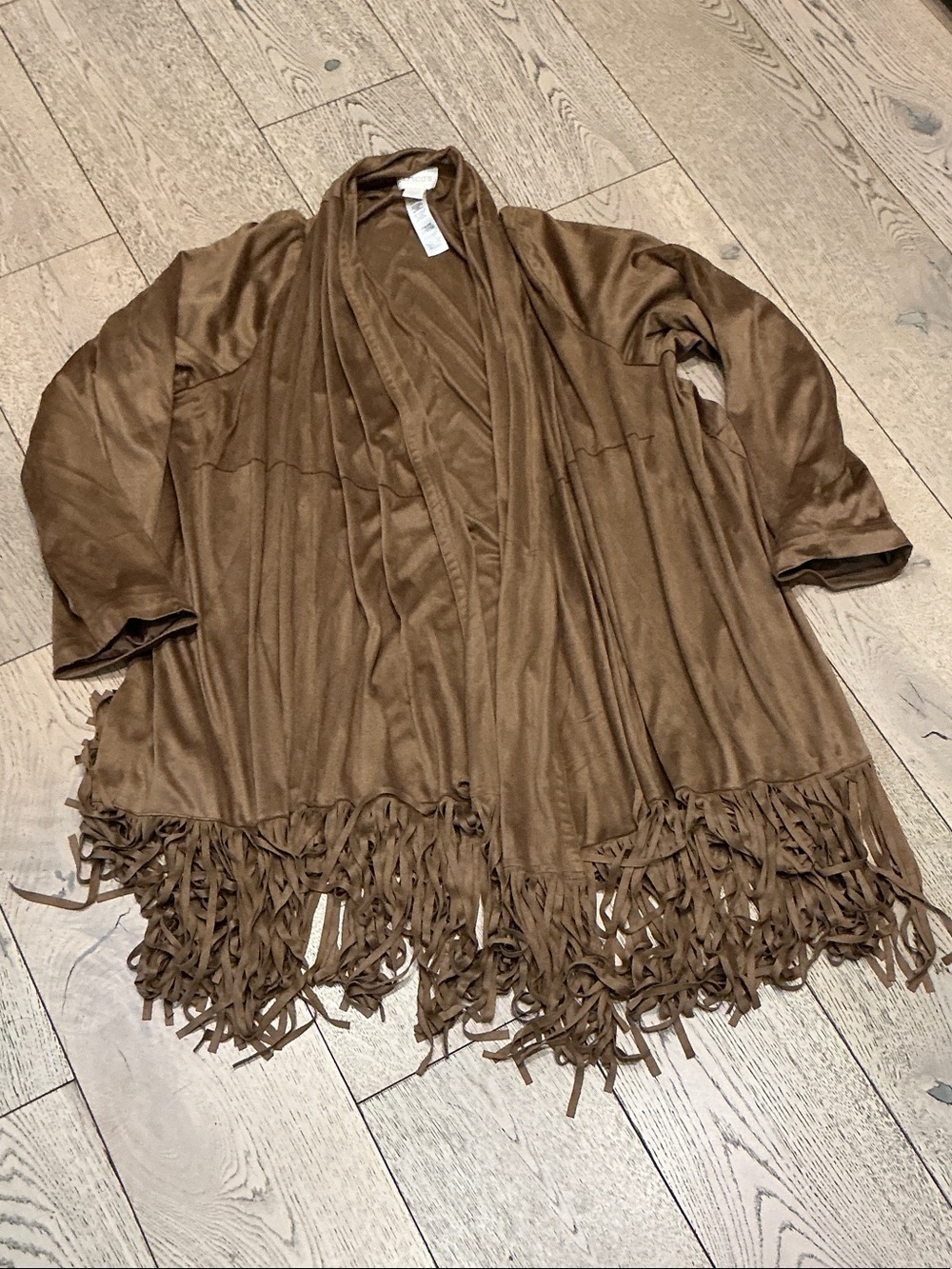 Woman’s Chico’s brown ultra suede fringe jacket. Size 3. Shawl collar. Like new!